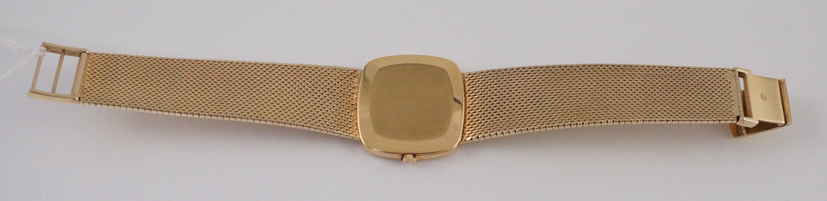 A gentleman's 1970's 18ct gold Rolex Cellini manual wind wrist watch, on an integral brushed gold bracelet